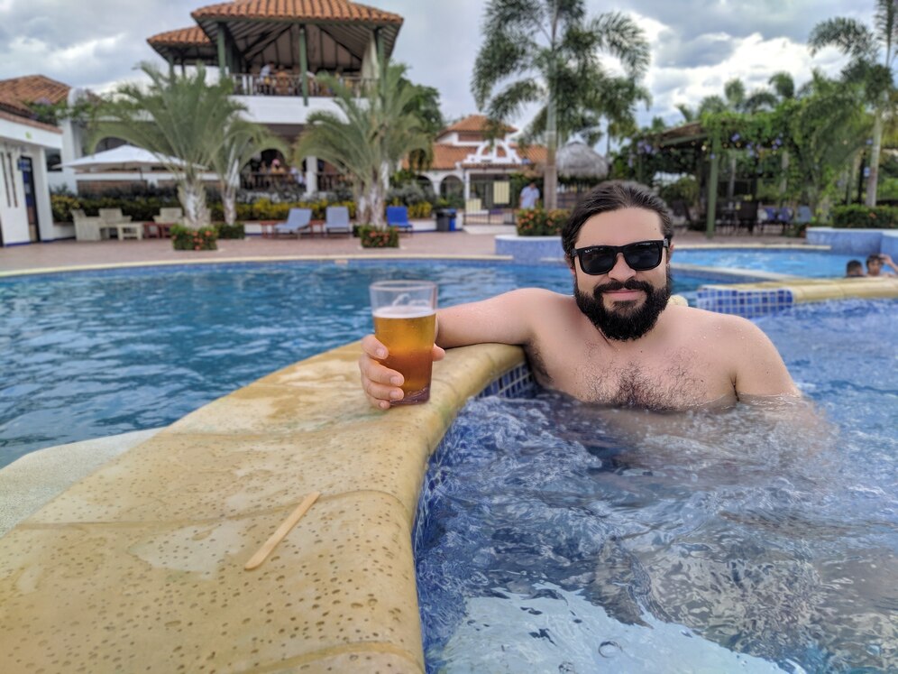 handsome looking man with beard pool holding glass beer 181624 32712