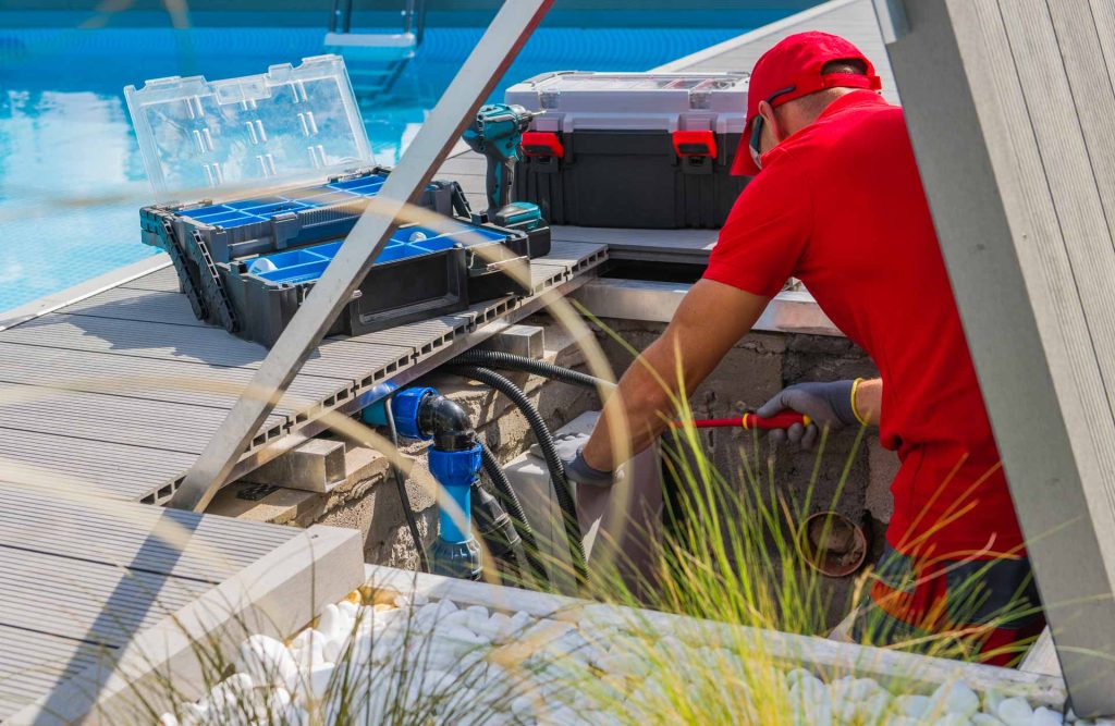 technician fixing swimming pool heating system 2023 11 27 04 58 22 utc 1024x667 1